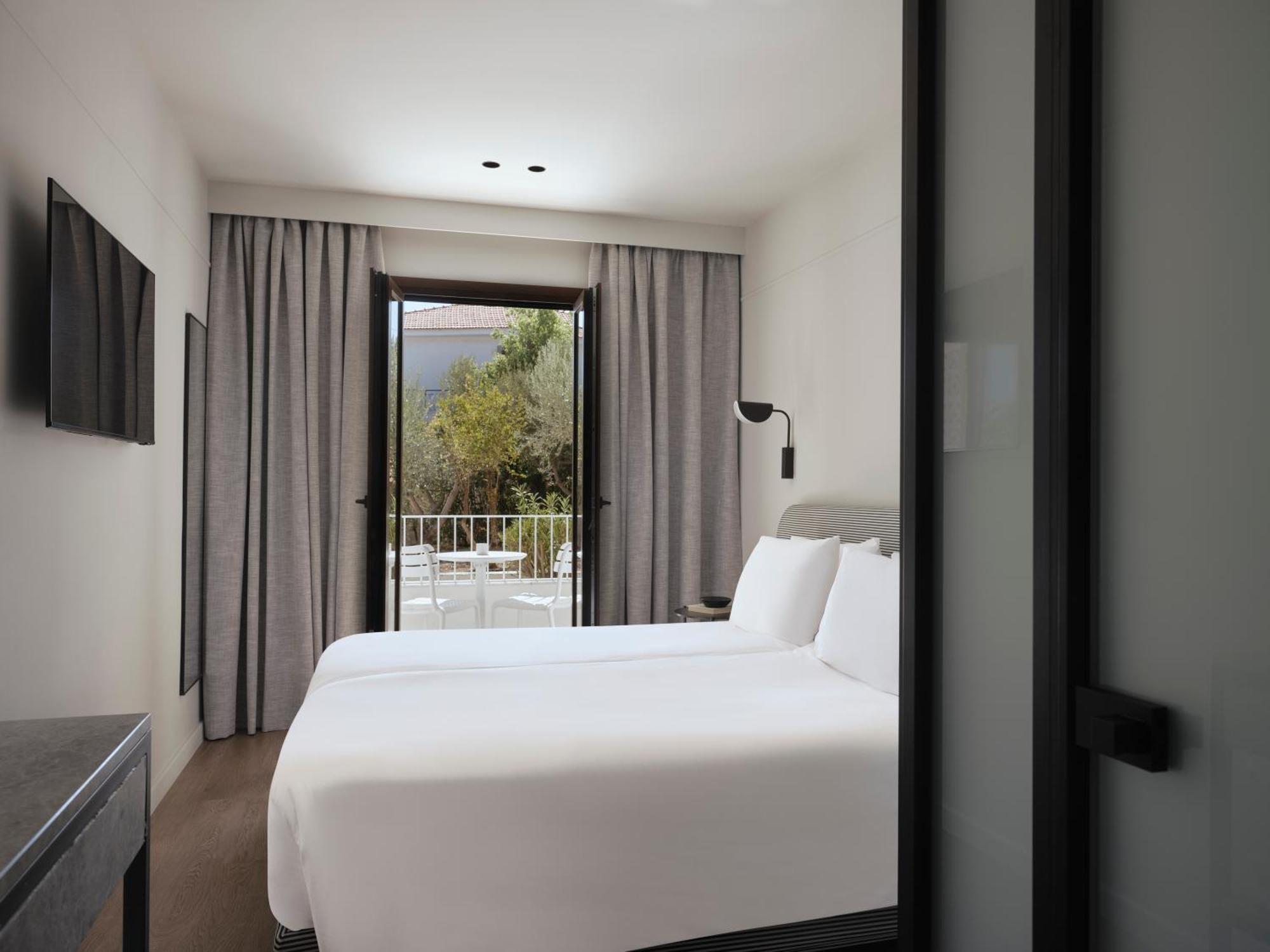 Doryssa Lithos Hotel ปีตาโกเรโย ภายนอก รูปภาพ