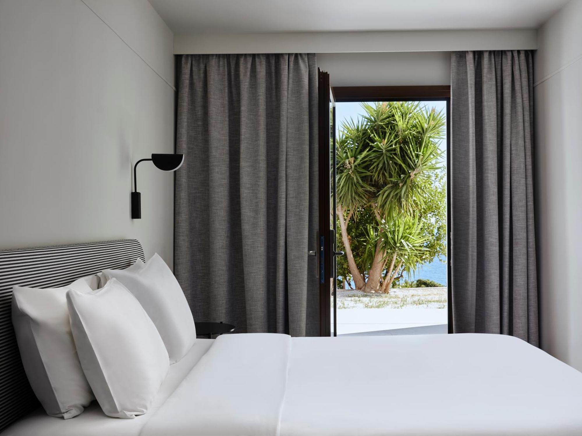 Doryssa Lithos Hotel ปีตาโกเรโย ภายนอก รูปภาพ