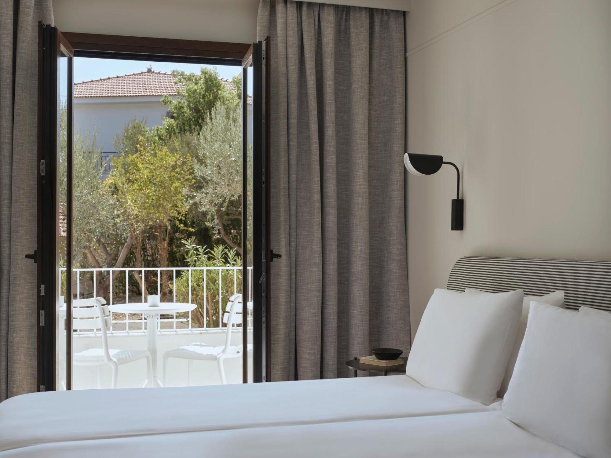 Doryssa Lithos Hotel ปีตาโกเรโย ภายนอก รูปภาพ